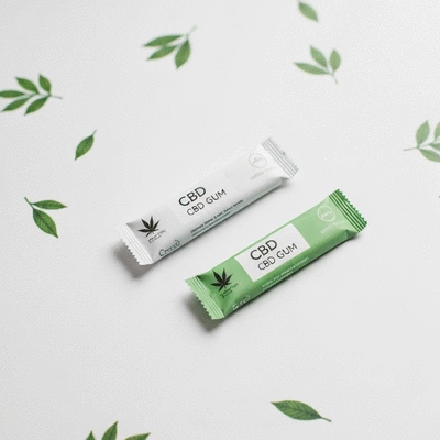 CBD gum packaging on a clean white surface with a subtle green leaf design, no text, no words, no typography, clean image