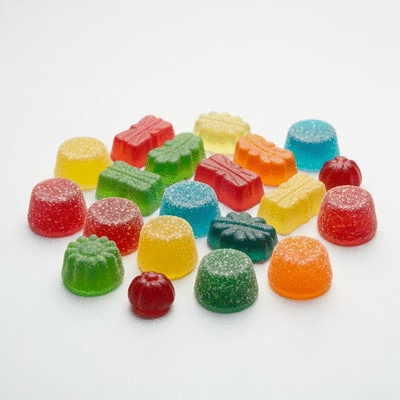 Assortment of colorful broad-spectrum CBD gummies on a clean, light background, no text, no words, no typography, 8K